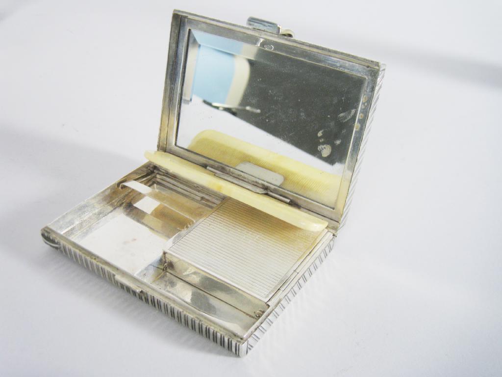 Appraisal: A Continental silver lady's Vanity Case with interior compartments and