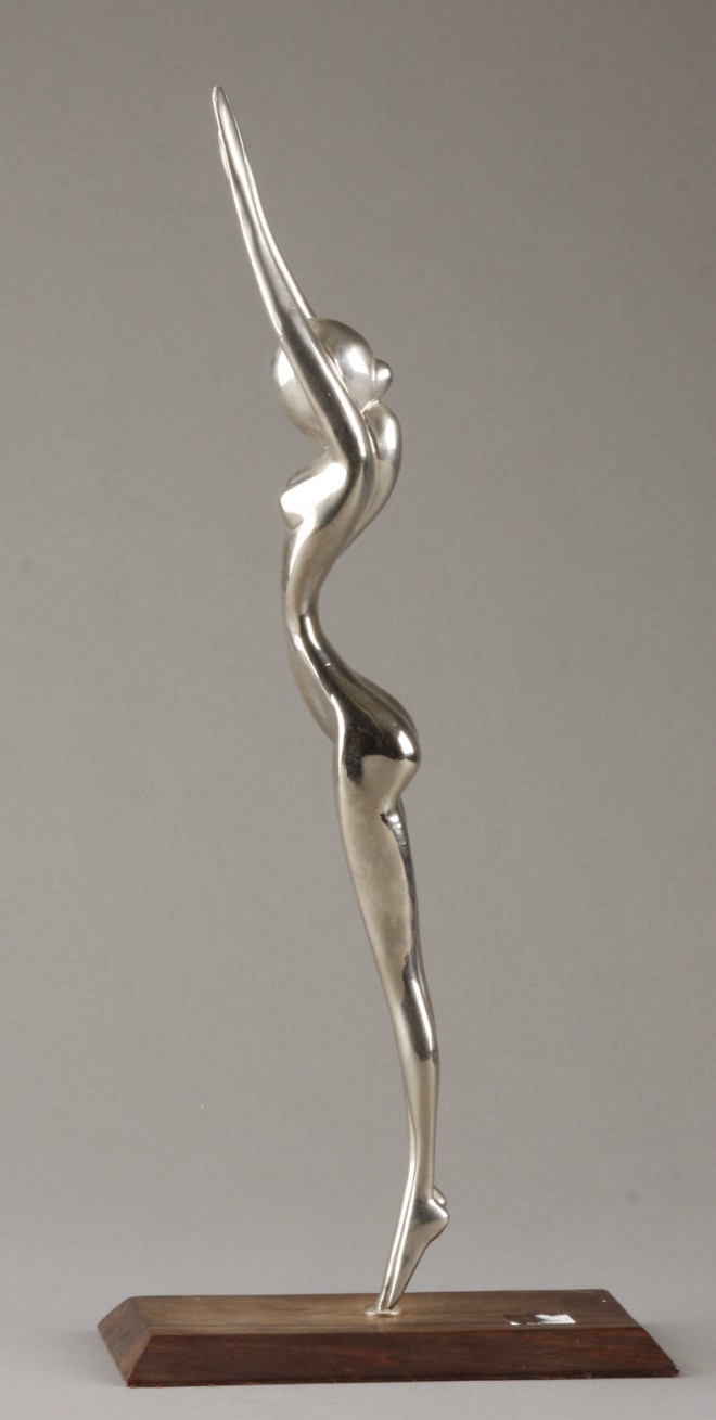 Appraisal: Sculpture of a nude female in diving position t metal