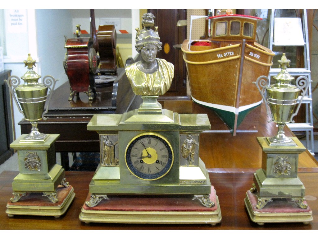 Appraisal: Three piece brass and gilt metal clock garniture