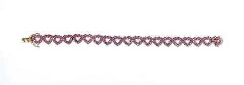 Appraisal: PINK SAPPHIRE BRACELET Ros gold Decorative bracelet of open heart