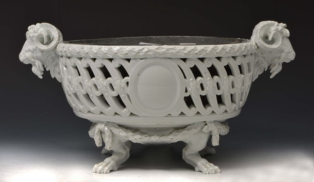 Appraisal: A MEISSEN WHITE GROUND OVAL PLANTER with metal liner the