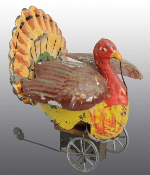 Appraisal: Tin Hand-Painted Turkey Wind-Up Toy Description German Working Stationary wing