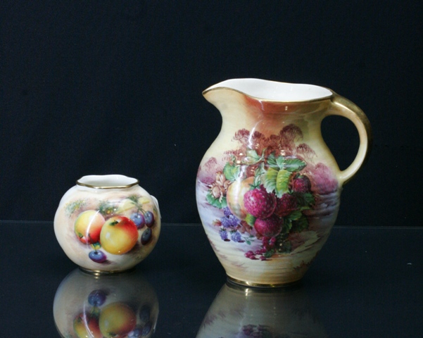 Appraisal: A Royal Worcester vase by Roberts together with Crown Devon