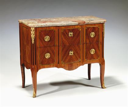 Appraisal: Transitional tulipwood stained fruitwood and amaranth marble top commode circa