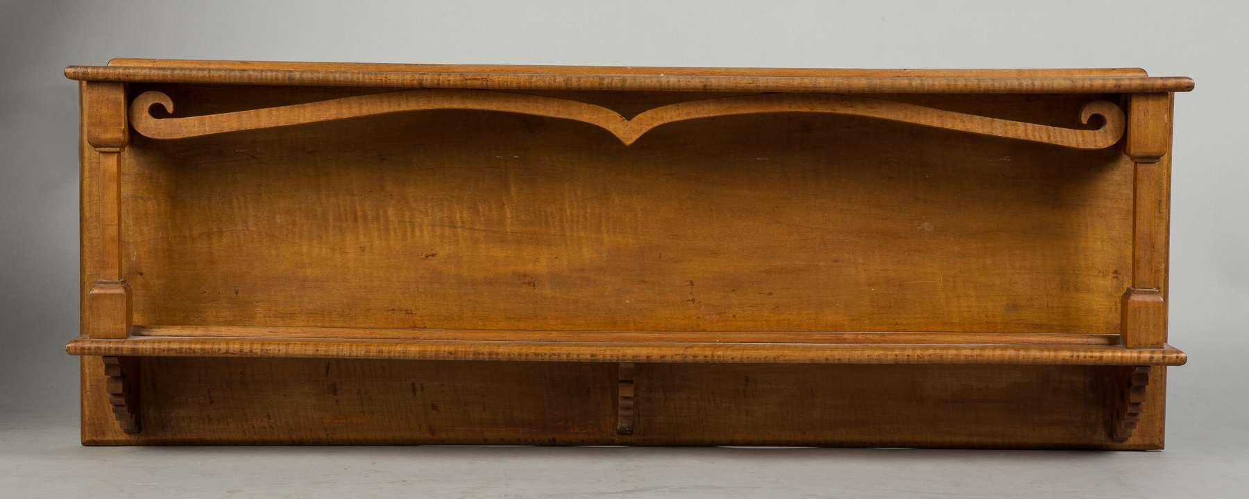 Appraisal: Tiger Maple Wall Shelf th century With cut out valence