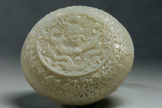 Appraisal: FINE WHITE JADE DRAGON BOX Fully openwork and meticulously carved