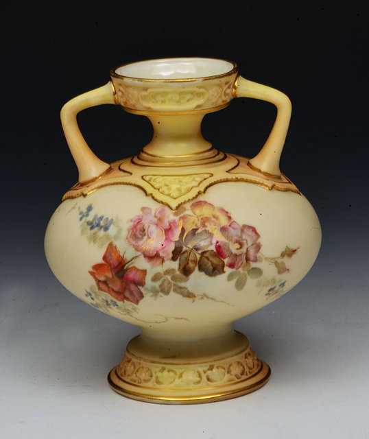 Appraisal: A ROYAL WORCESTER TWO HANDLED VASE of bulbous form painted