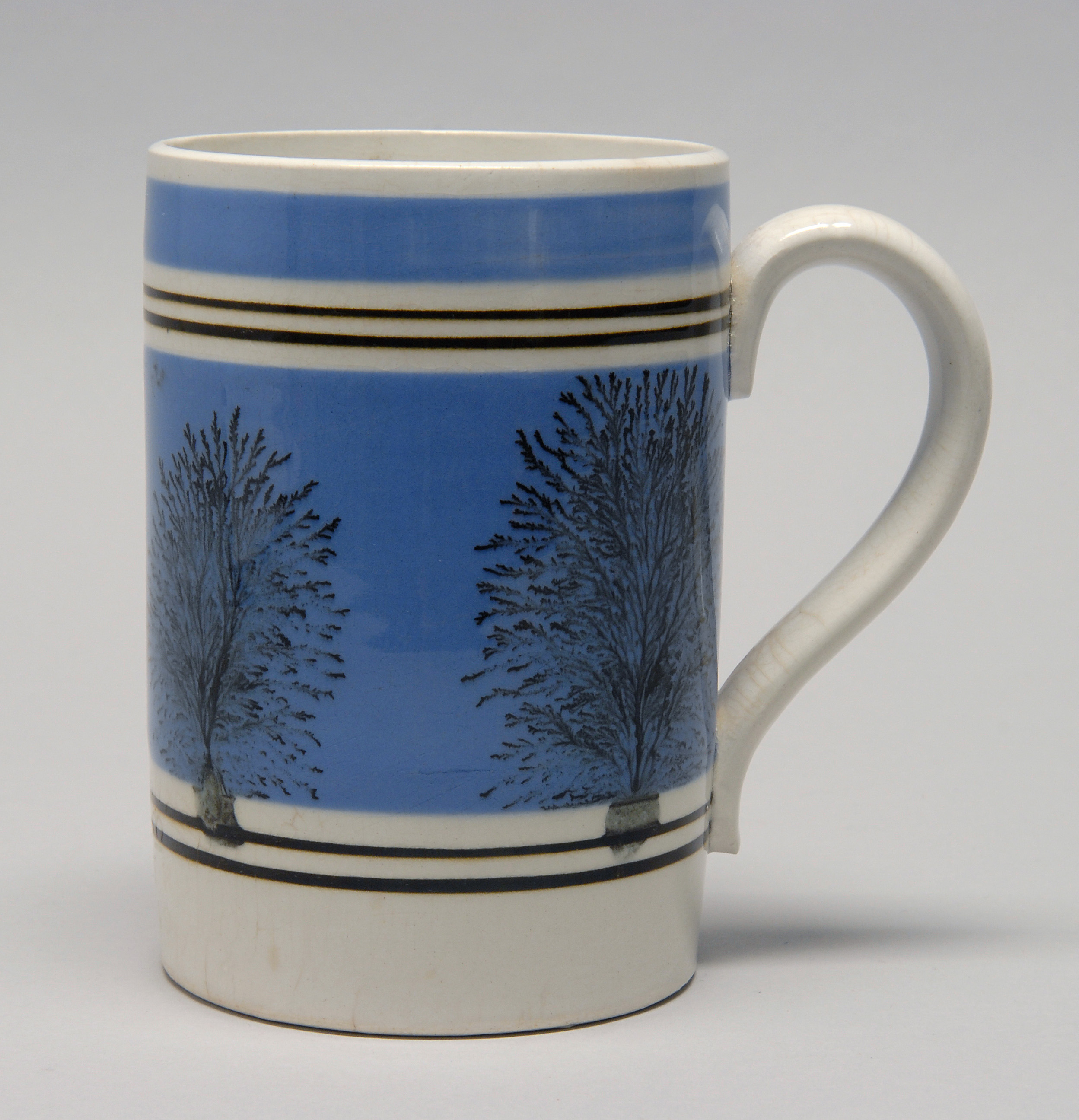 Appraisal: MOCHAWARE MUG England th CenturyCylindrical body with black seaweed decoration