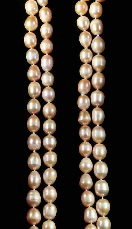 Appraisal: ENDLESS STRAND BAROQUE PEARL NECKLACE iridescent pink pearls measuring mm-