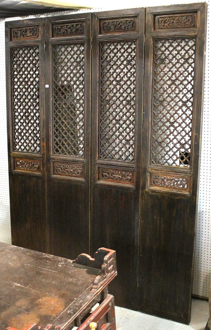 Appraisal: A large th Chinese carved and pierced hardwood four fold