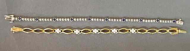 Appraisal: Two ladies bracelets- one k yg with five clusters of