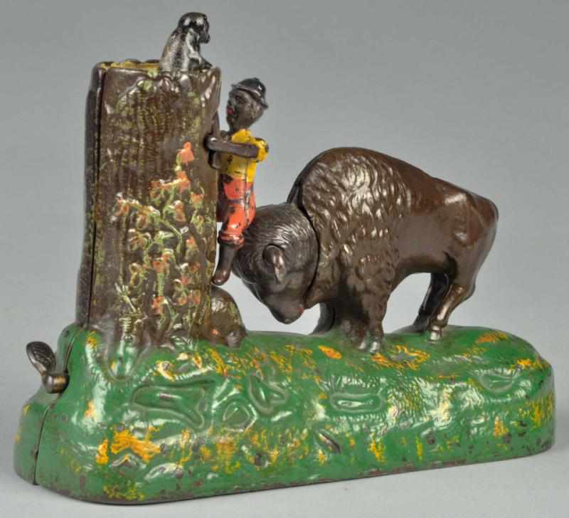 Appraisal: Cast Iron Butting Buffalo Mechanical Bank Description Working Manufactured by