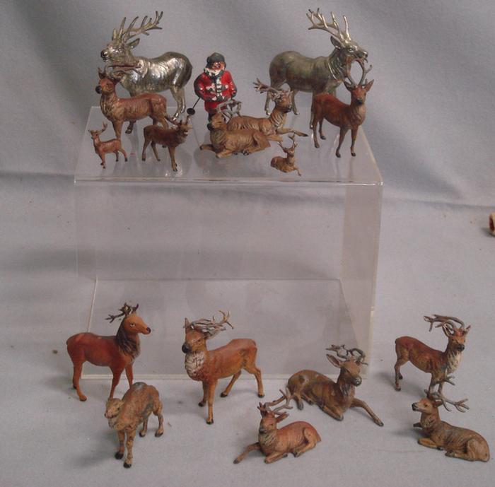 Appraisal: cast metal reindeer one camel one Santa Estimate -