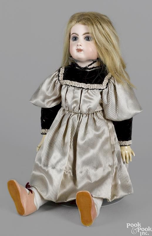 Appraisal: E J Jumeau doll with a bisque socket head blue