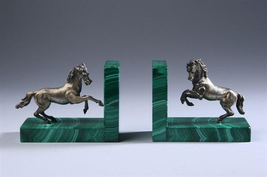 Appraisal: PAIR ITALIAN MALACHITE-MOUNTED SILVER FIGURAL BOOKENDS Circa Milan mark Silver