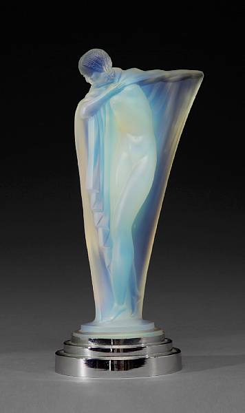 Appraisal: An Etling molded opalescent glass figure of a draped maiden