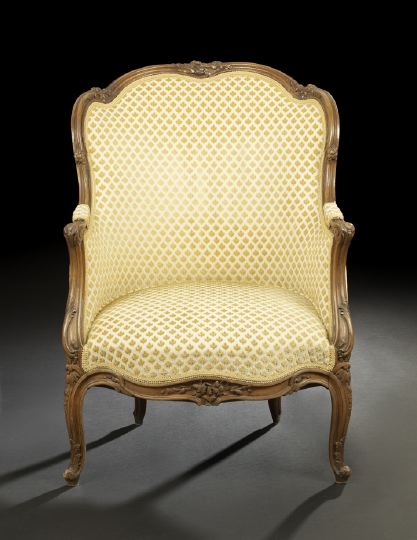 Appraisal: Louis XV-Style Fruitwood Bergere fourth quarter th century the shaped