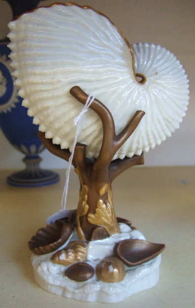 Appraisal: A Royal Worcester porcelain nautilus shell centre piece late th