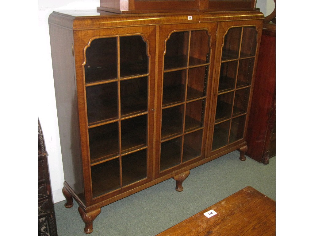 Appraisal: Walnut veneered door bookcase