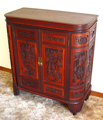 Appraisal: CHINESE CARVED TEAKWOOD BAR CABINET Generous in storage Interior fitted