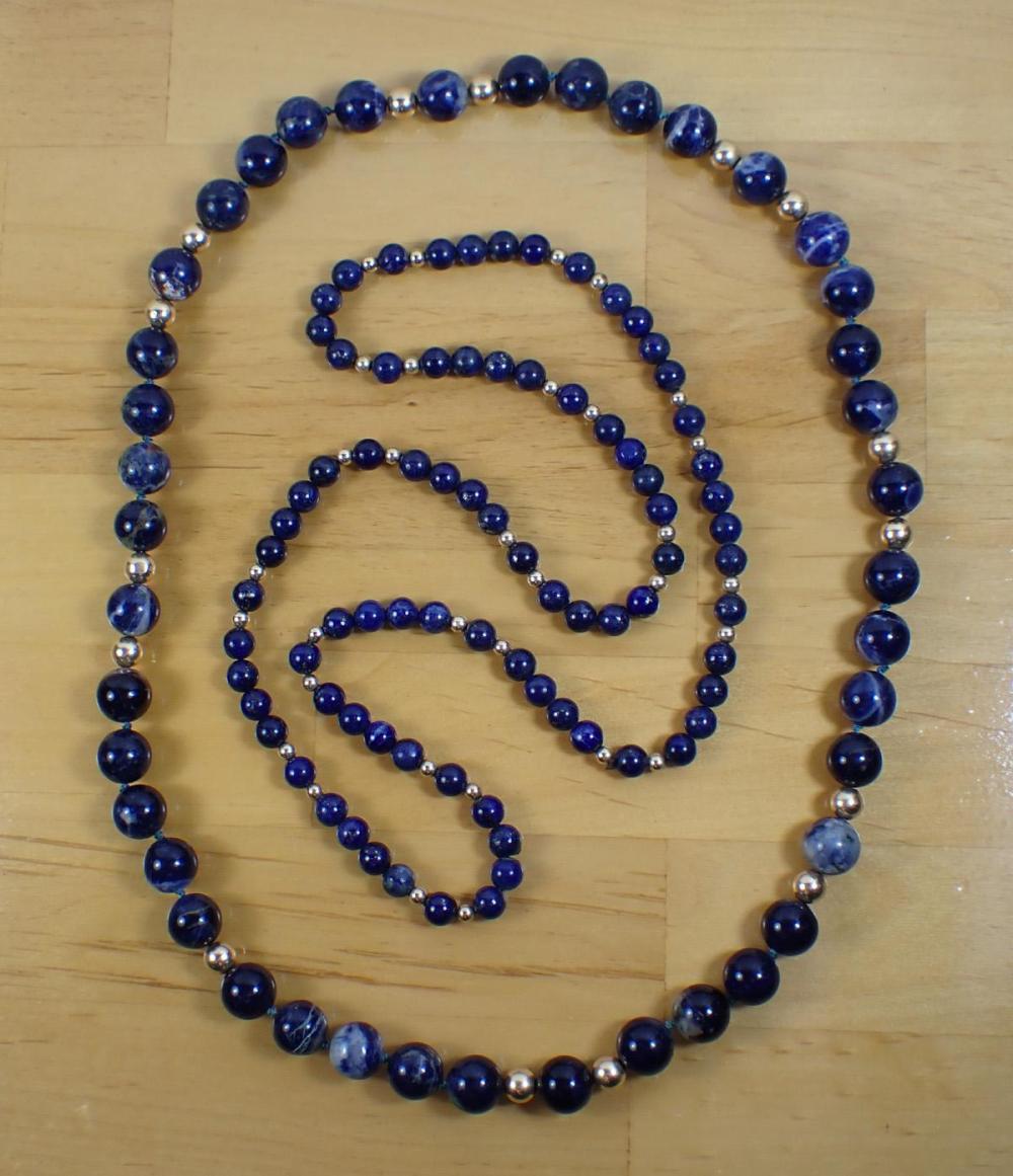 Appraisal: TWO LAPIS AND SODALITE BEAD NECKLACES including a strand with