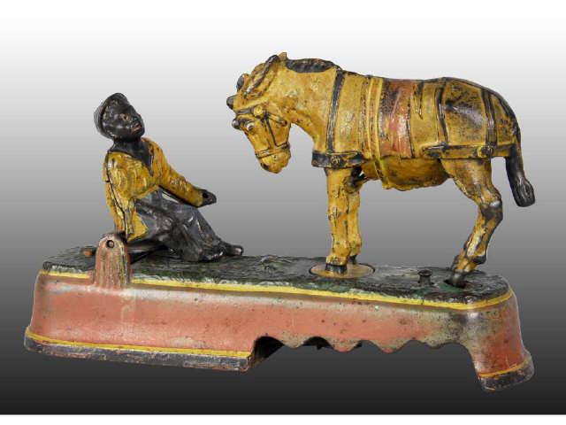 Appraisal: Cast Iron Spise a Mule Mechanical Bank Description Jockey on