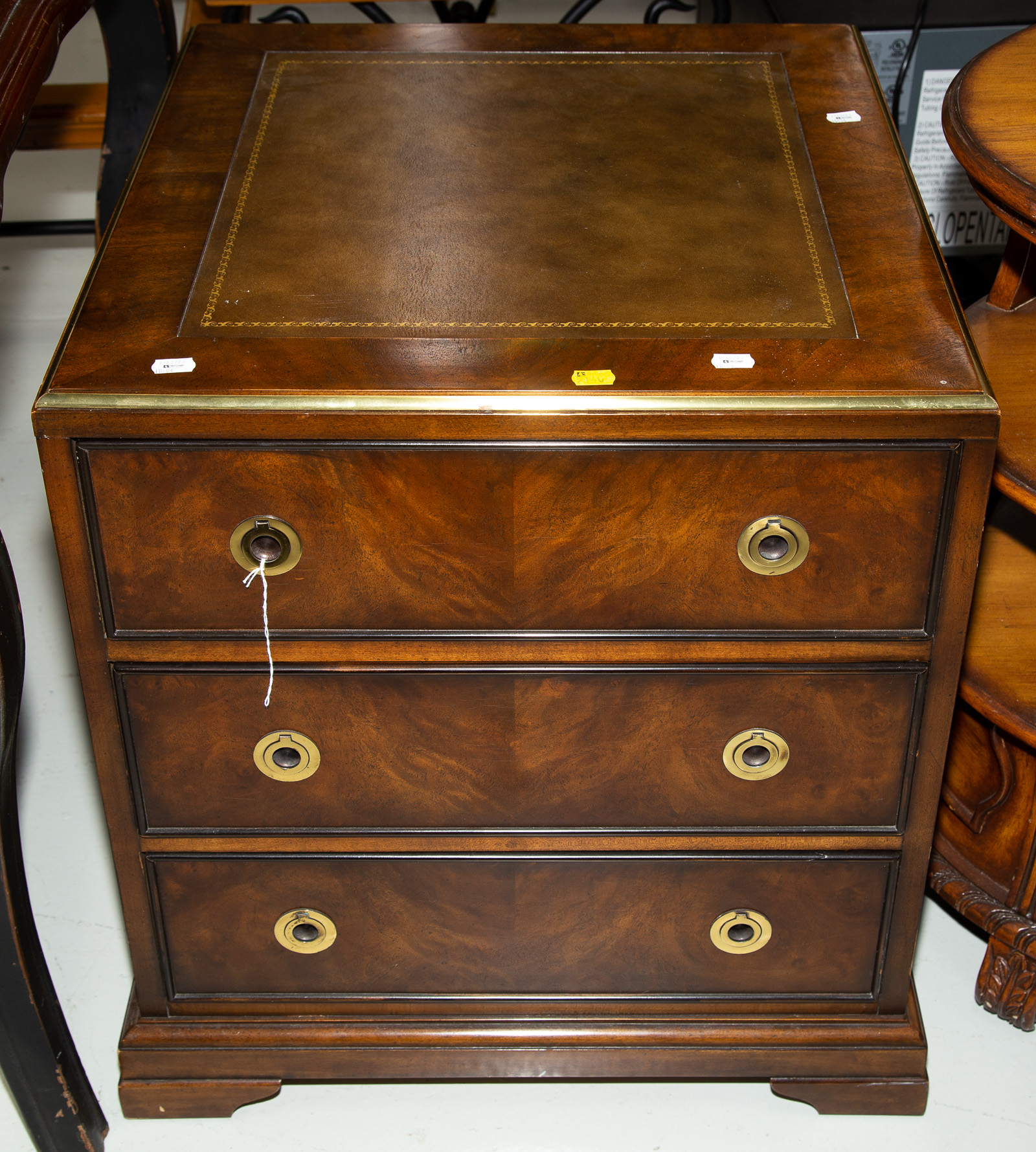 Appraisal: HERITAGE CAMPAIGN STYLE BACHELOR'S CHEST Modern fitted with three drawers