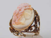 Appraisal: A yellow metal tests carat gold coral cameo ring cameo