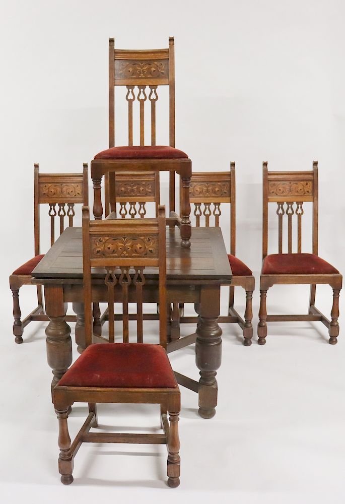 Appraisal: Antique Tudor Style Oak Table And Chairs Great size and