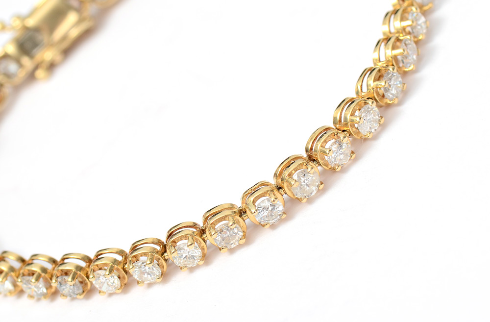 Appraisal: DIAMOND TENNIS BRACELET K yellow gold bracelet of Round brilliant