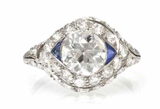 Appraisal: An Art Deco Platinum Diamond and Synthetic Sapphire Ring containing