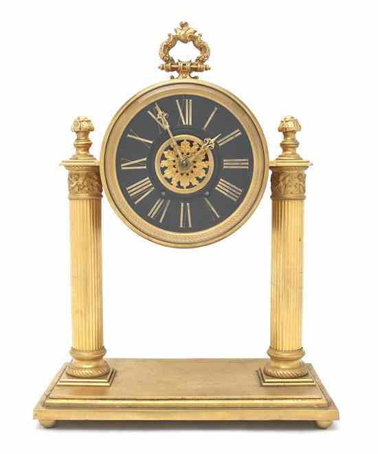 Appraisal: A Neoclassical Style Gilt Bronze Mantel Clock retailed by Spalding