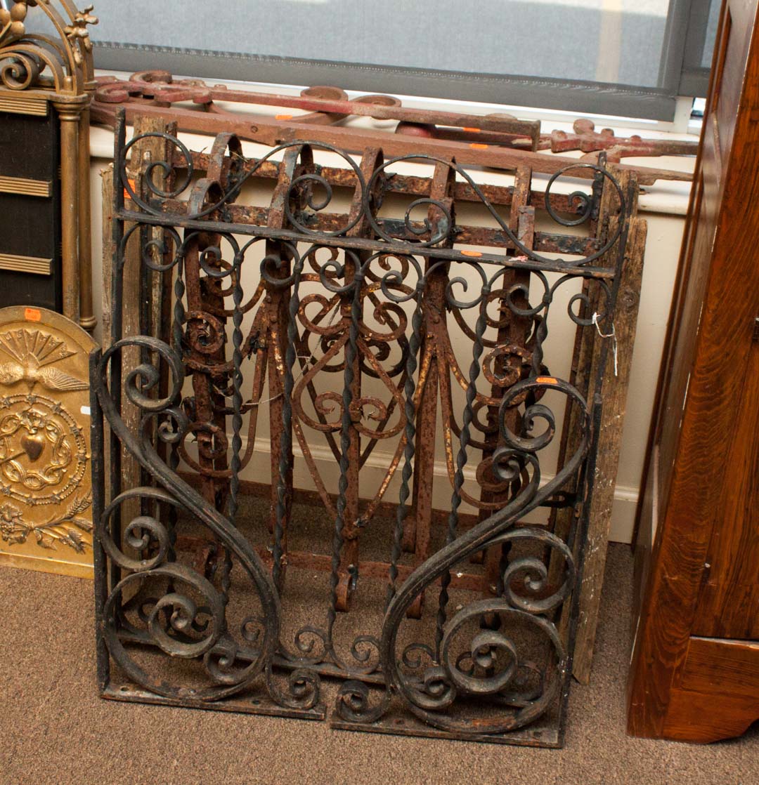 Appraisal: Eight pieces of decorative ironwork gate section and two window