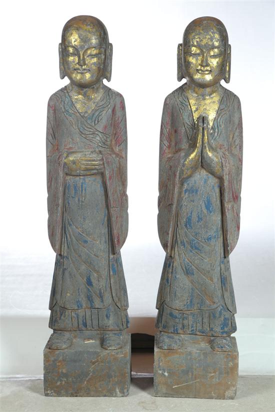 Appraisal: PAIR OF STONE STATUES Asian th century Robed Lohans standing