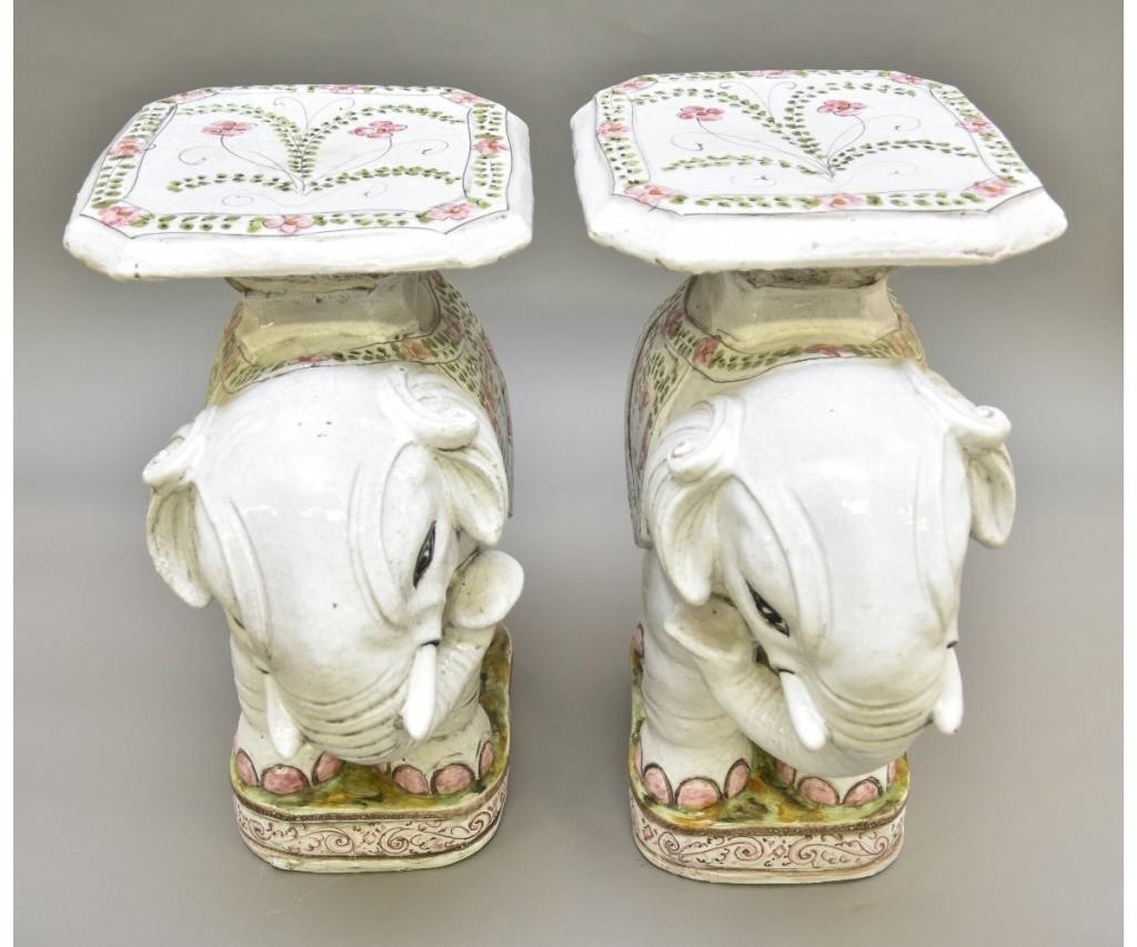 Appraisal: Pair of terracotta glazed elephant tables with colorful decorations th