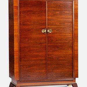 Appraisal: Jules Leleu French - Armoire c rosewood veneer glass gilt