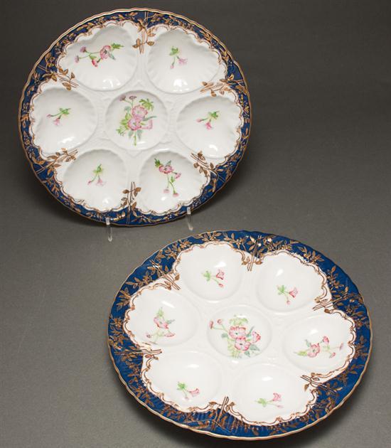 Appraisal: Pair of Limoges floral decorated porcelain oyster plates th century