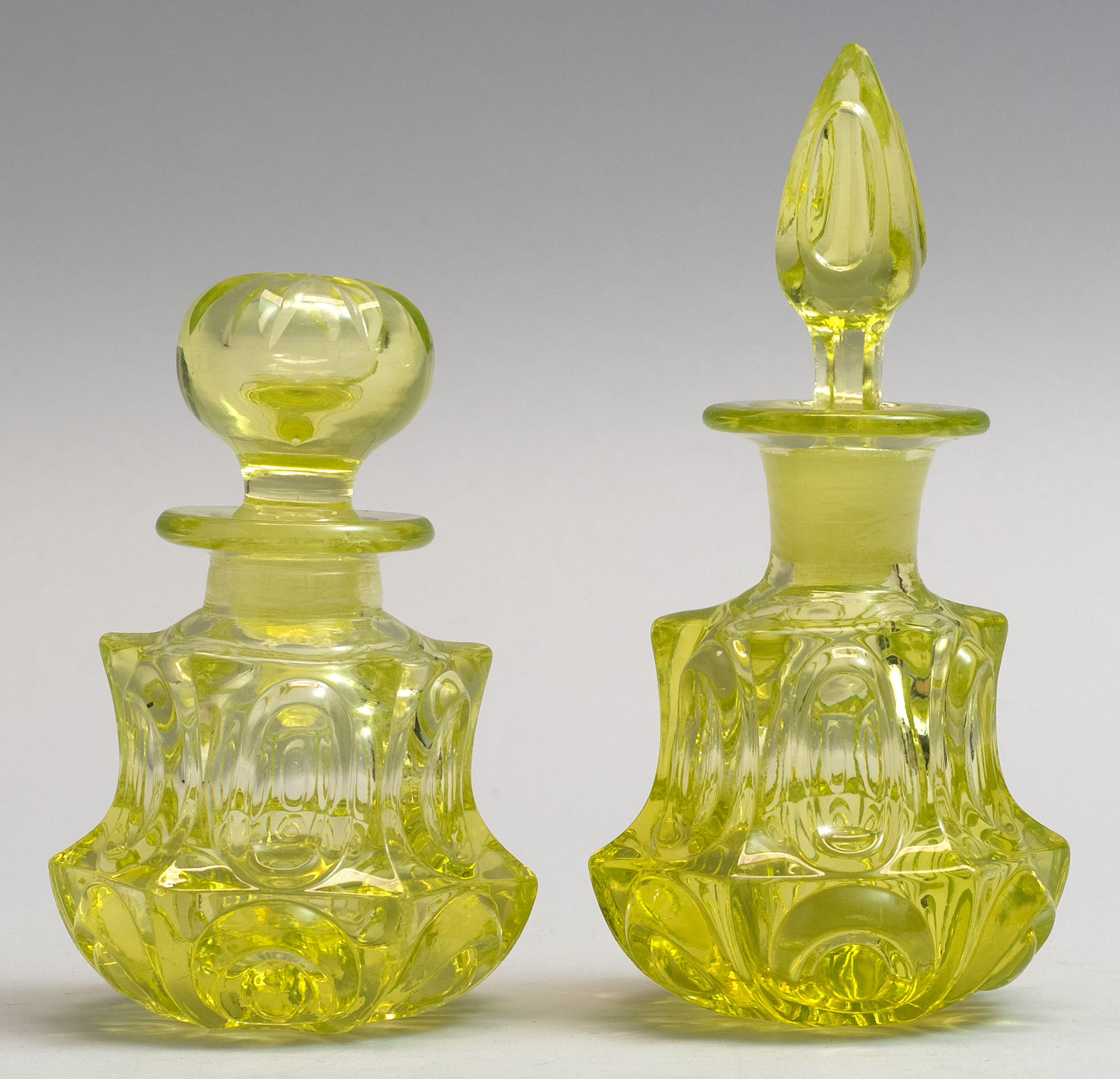 Appraisal: TWO SANDWICH GLASS COMPANY BLOWN-MOLDED COLOGNE BOTTLES Mid- th CenturyBoth