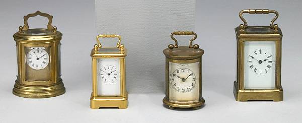 Appraisal: A group of four brass miniature carriage timepieces th century