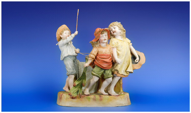 Appraisal: Bisque Figure Group children one with a large fishing net