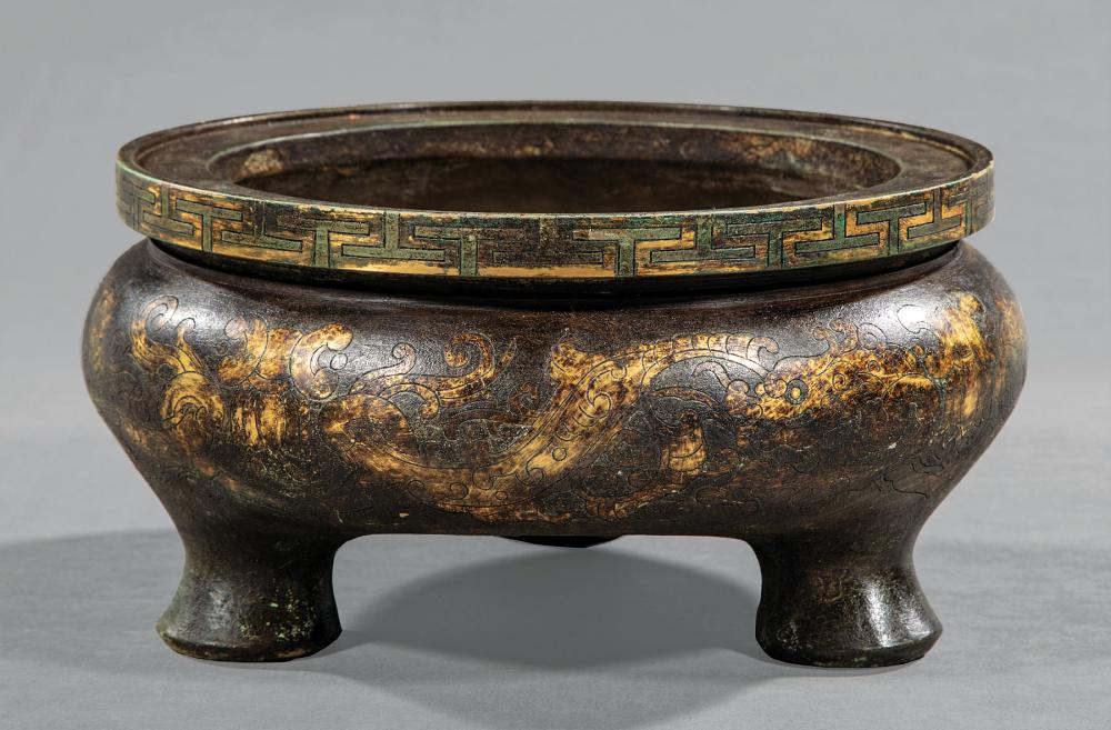 Appraisal: Chinese Gilt and Patinated Bronze Tripod Censer bomb body with