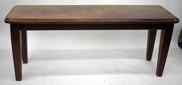 Appraisal: A NARROW MAHOGANY TABLE with square tapering legs the top