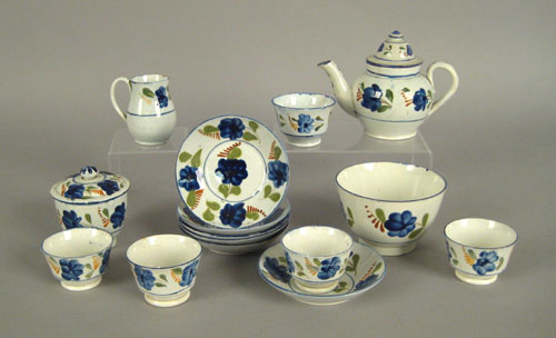 Appraisal: Miniature pearlware tea service th c with blue floral decoration