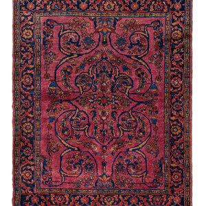 Appraisal: A Sarouk Wool Rug Circa feet inches x feet inches