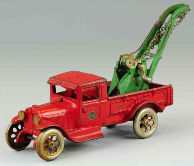 Appraisal: ARCADE FORD WRECKER Cast iron painted in red body open