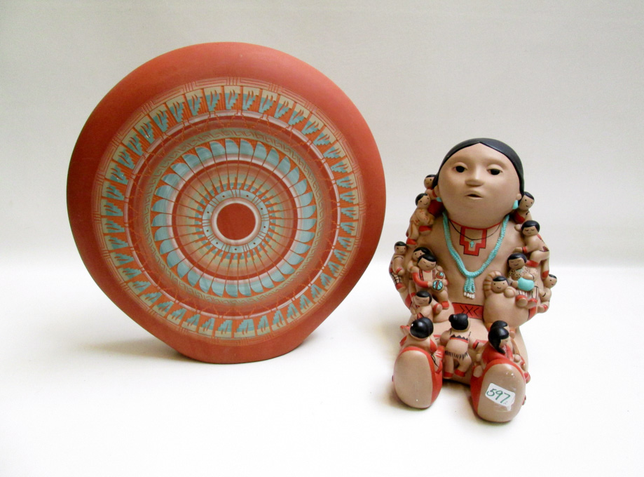 Appraisal: TWO NATIVE AMERICAN POTTERY SCULPTURES one of a figural group