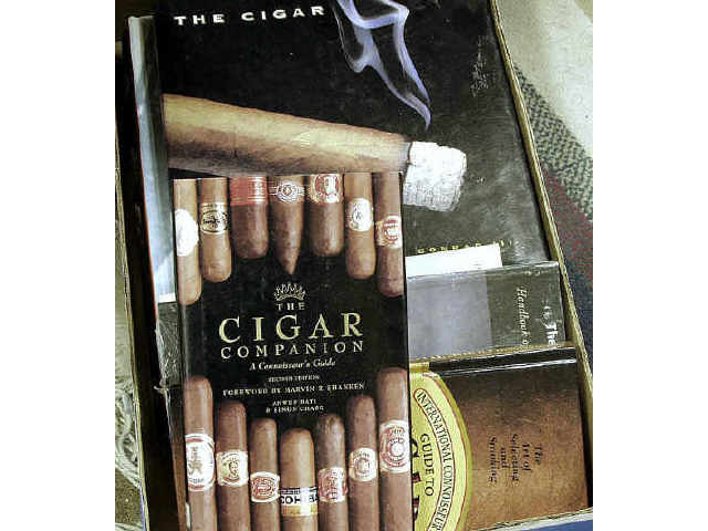 Appraisal: Box lot of cigar and smoking books Estimate -