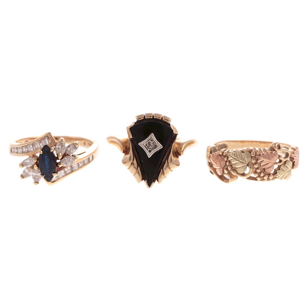 Appraisal: A Trio of Gemstone Rings in Gold K yellow gold