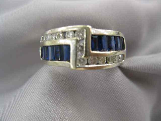 Appraisal: Sapphire Diamond Ring round diamonds totaling carats and rectangular calibre