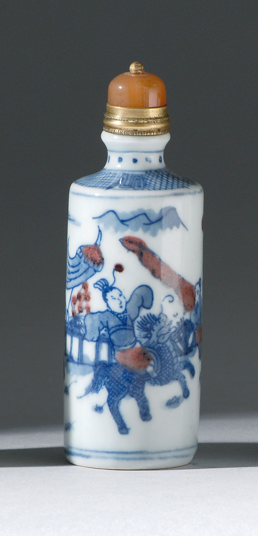 Appraisal: UNDERGLAZE RED AND BLUE PORCELAIN SNUFF BOTTLE Late th CenturyIn